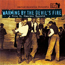Bessie Smith / Billie Holiday / Charley Patton / James Elmore / Jelly Roll Morton / John Hurt / John Lee Hooker / Ma Rainey / Muddy Waters / Robert Johnson / Sister Rosetta Tharpe / Son House / Sonny Boy Williamson / W.c. Handy - Warming by the devil's fire (B.O.F.)